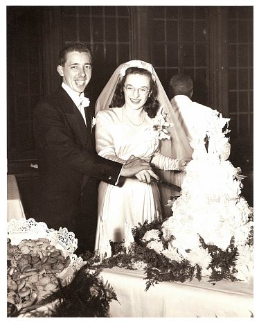 1948 - Bianca and Rob Wedding - cake cutting.jpg